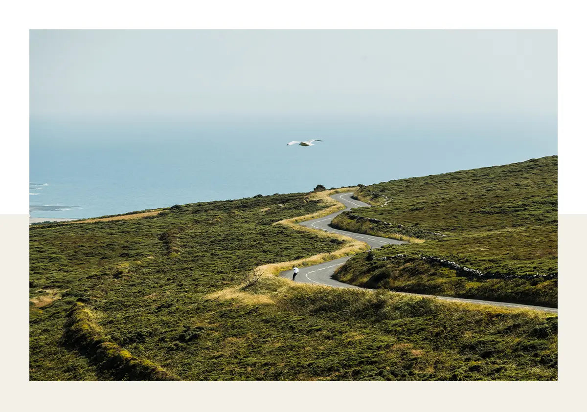 Arbor Bamboo Darmaeva longboarding on Isle of man